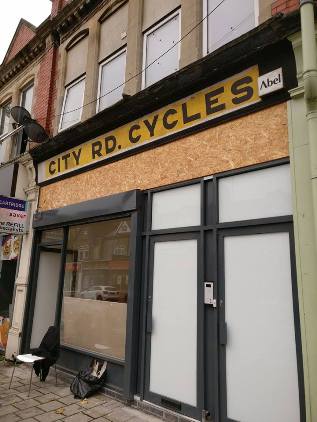 211 City Road in 2017 uncovers an old sign